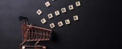 Black Friday Sale lettering and shopping cart on a black background