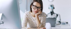 Disappointed stressed woman and AI robot in the office