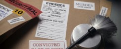 Files and evidence bag in a crime lab, conceptual image