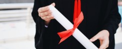 Graduate girl holding diploma