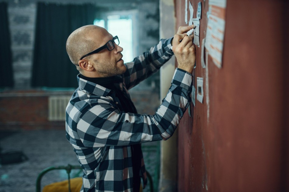 Maniac kidnapper looks at the ads of his victims