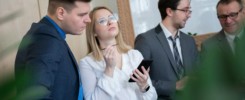 team of caucasian bussines people debating during a work meeting. Colleagues in serious discussions