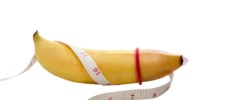 yellow banana with mesurement and condom