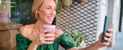 young woman drinking a healthy drink for social media