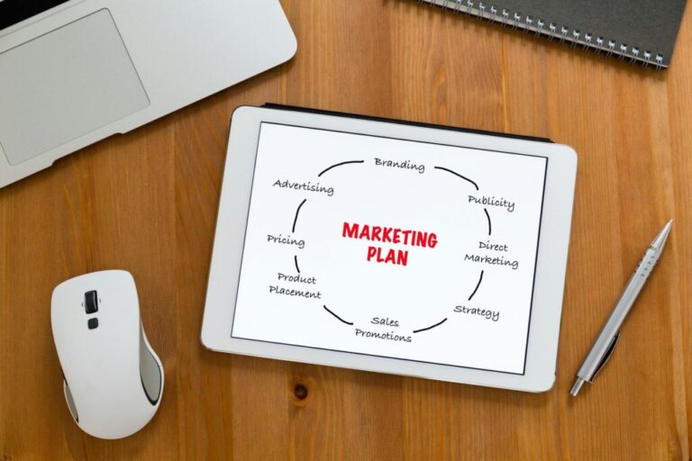 A lelki élet mozgatórugói a marketingben Modern working desk with tablet showing marketing planning