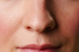 Close-Up of a Womans Lips and Nose With a Neutral Expression