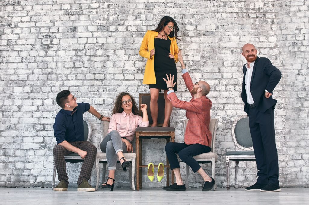 Successful team leader manager, CEO, market leader and another business leading concepts. Standing