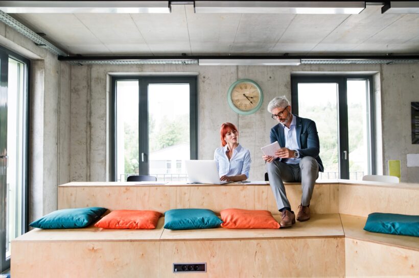 Business people in the office consulting a project.