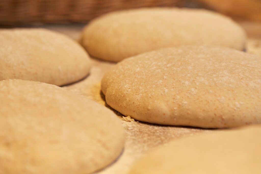 close up of yeast bread dough at bakery