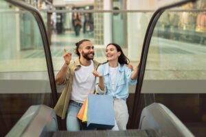 Glad millennial european family shopaholics customers with many packages enjoy walk, customer