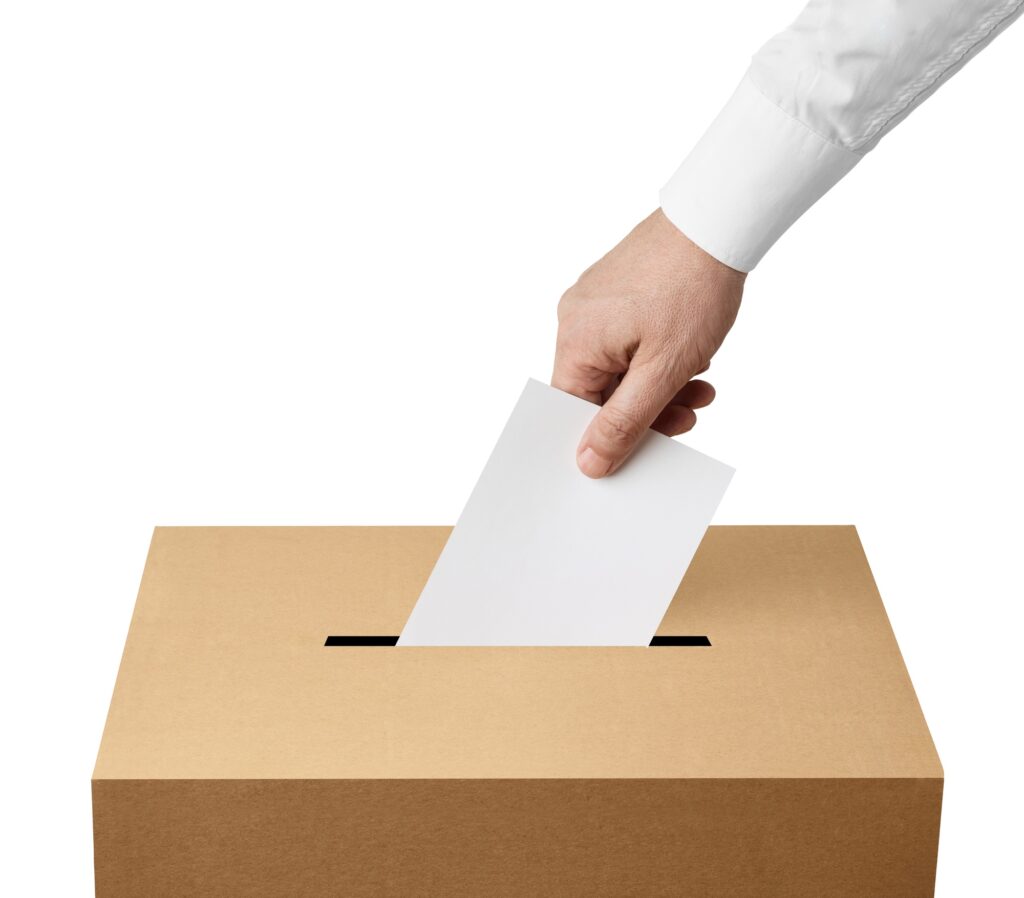 ballot box casting vote election referendum politics elect man female democracy hand voter political