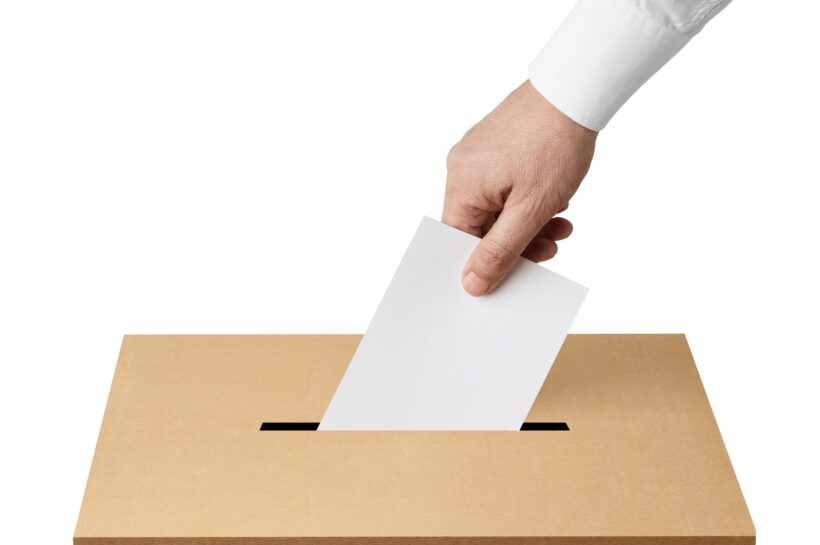 ballot box casting vote election referendum politics elect man female democracy hand voter political